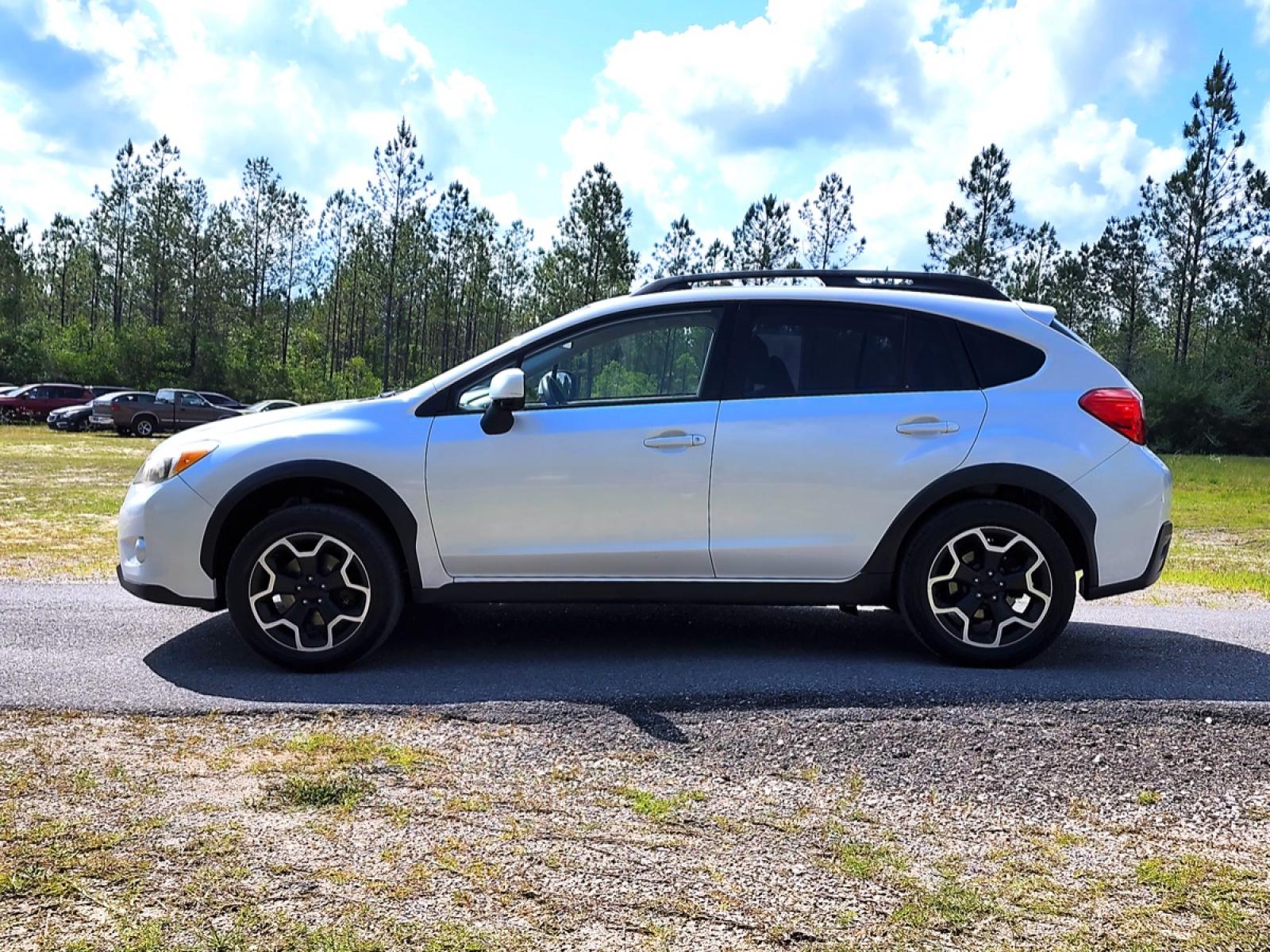 2013 White Subaru XV Crosstrek 2.0 Limited (JF2GPACC5D1) with an 2.0L L4 DOHC 16V engine, 5-Speed Manual transmission, located at 18001 Kellogg Rd, Saucier, MS, 39574, (228) 832-1441, 139.421463, -76.641457 - SUPER SHARP !! 2013 SUBARU XV CROSSTREK 2.0 LIMITED – SUBARU Strong! - 2.0L DOHC 16V – ALL WHEEL DRIVE !! – Runs GREAT - Just Serviced! – CARFAX 2-OWNER Vehicle – CARFAX Well-Maintained Vehicle! – FUEL SAVER!! est. 33 MPG hwy! – Ice COLD A/C - Photo #3
