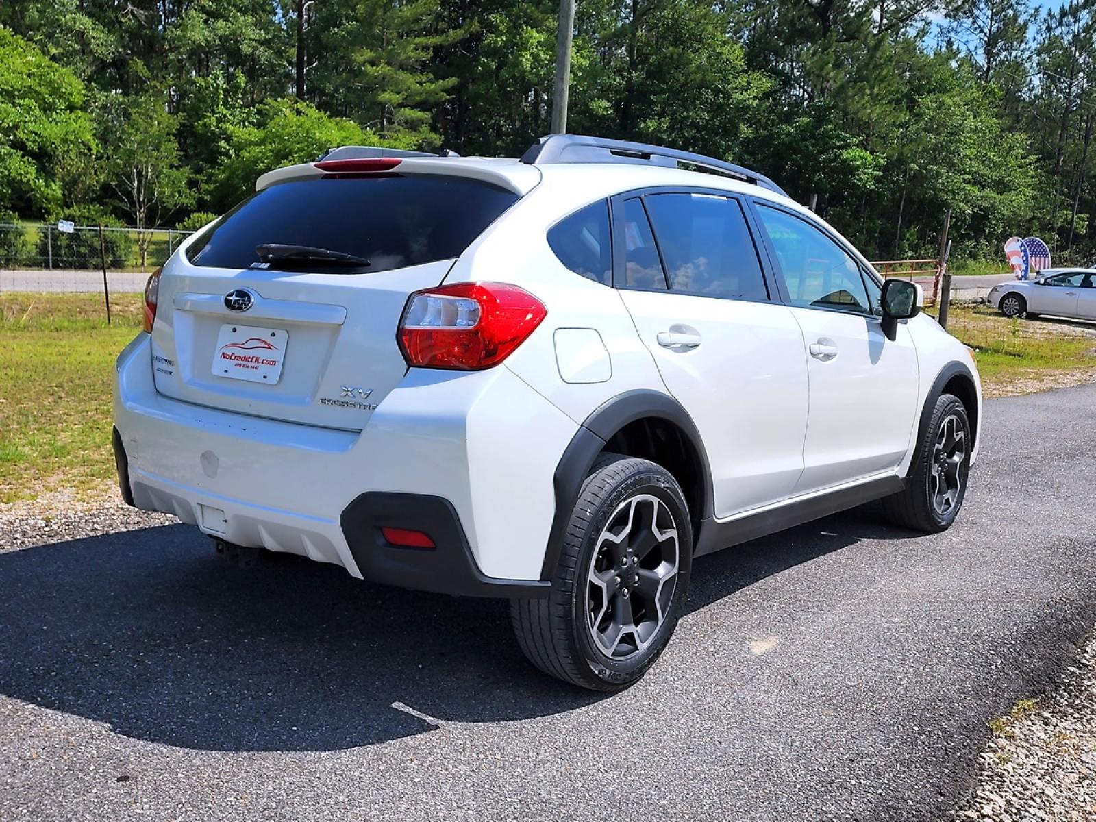 2013 White Subaru XV Crosstrek 2.0 Limited (JF2GPACC5D1) with an 2.0L L4 DOHC 16V engine, 5-Speed Manual transmission, located at 18001 Kellogg Rd, Saucier, MS, 39574, (228) 832-1441, 139.421463, -76.641457 - SUPER SHARP !! 2013 SUBARU XV CROSSTREK 2.0 LIMITED – SUBARU Strong! - 2.0L DOHC 16V – ALL WHEEL DRIVE !! – Runs GREAT - Just Serviced! – CARFAX 2-OWNER Vehicle – CARFAX Well-Maintained Vehicle! – FUEL SAVER!! est. 33 MPG hwy! – Ice COLD A/C - Photo #4
