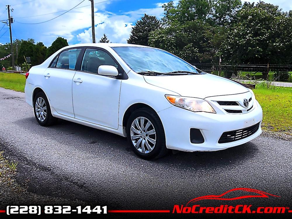 2012 White Toyota Corolla LE (2T1BU4EE0CC) with an 1.8L L4 DOHC 16V engine, 5-Speed Automatic transmission, located at 18001 Kellogg Rd, Saucier, MS, 39574, (228) 832-1441, 139.421463, -76.641457 - Photo #2