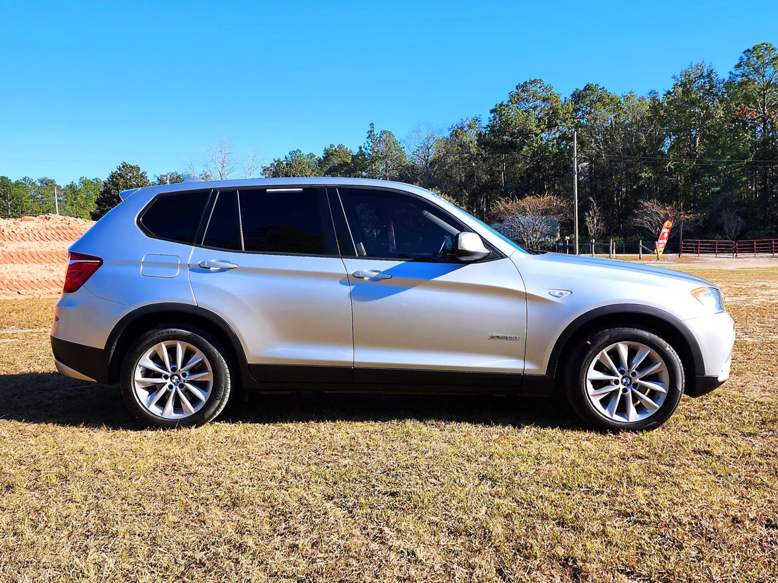 2013 Silver BMW X3 xDrive28i (5UXWX9C58D0) with an 3.0L L6 DOHC 24V engine, 8-Speed Automatic transmission, located at 18001 Kellogg Rd, Saucier, MS, 39574, (228) 832-1441, 139.421463, -76.641457 - CLEAN CARFAX !! 2013 BMW X3 XDRIVE28I – BMW Strong! - 3.0L DOHC 24V – ALL WHEEL DRIVE !! – Runs GREAT - Just Serviced! – CLEAN CARFAX Vehicle! – AUTOMATIC Transmission – PUSH to START – Ice COLD A/C with Rear Controls – DUAL Sunroof / Mo - Photo #3