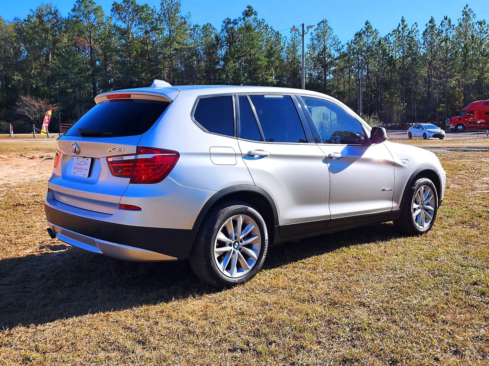 2013 Silver BMW X3 xDrive28i (5UXWX9C58D0) with an 3.0L L6 DOHC 24V engine, 8-Speed Automatic transmission, located at 18001 Kellogg Rd, Saucier, MS, 39574, (228) 832-1441, 139.421463, -76.641457 - CLEAN CARFAX !! 2013 BMW X3 XDRIVE28I – BMW Strong! - 3.0L DOHC 24V – ALL WHEEL DRIVE !! – Runs GREAT - Just Serviced! – CLEAN CARFAX Vehicle! – AUTOMATIC Transmission – PUSH to START – Ice COLD A/C with Rear Controls – DUAL Sunroof / Mo - Photo #5