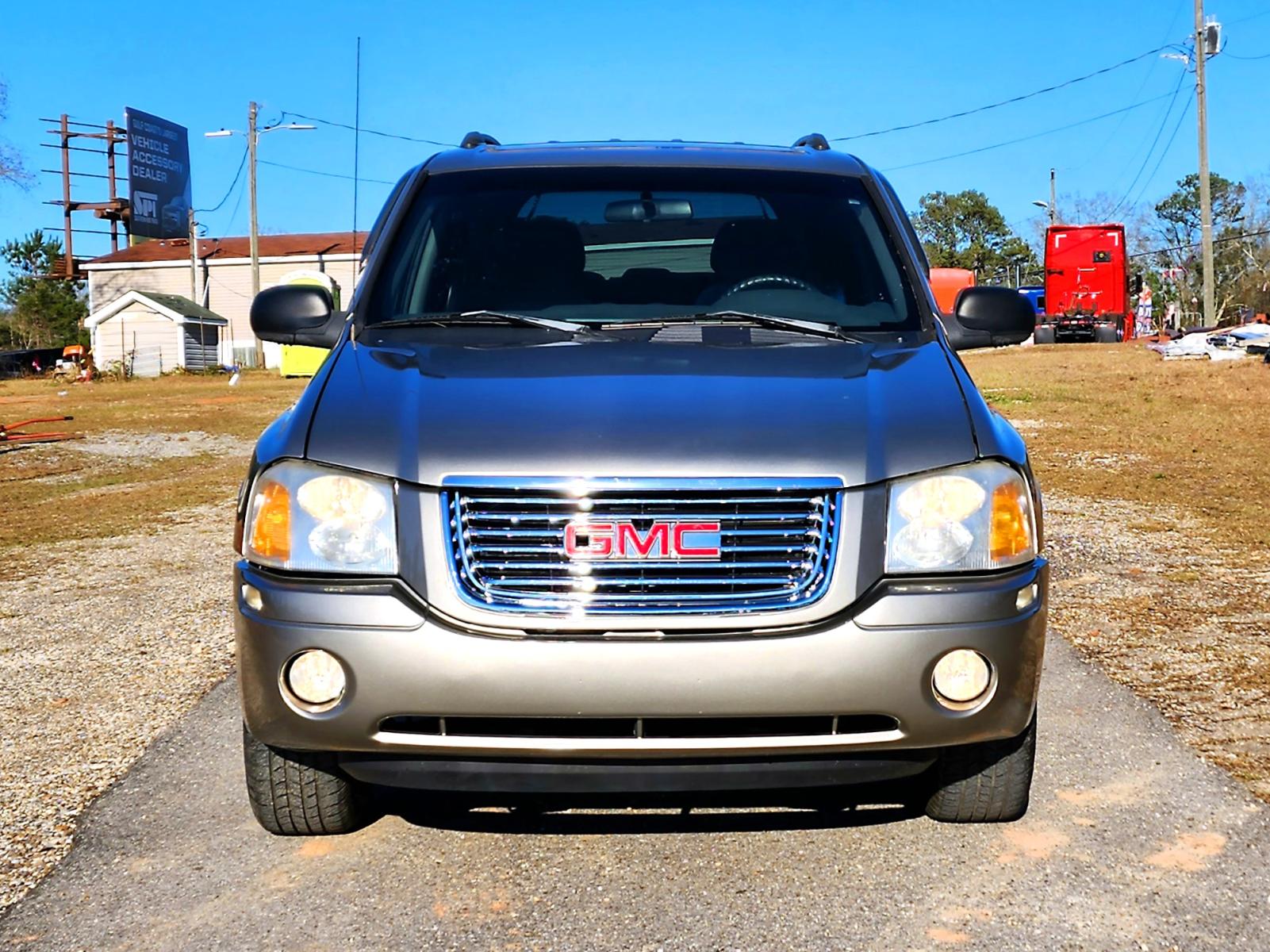 2003 Grey GMC Envoy SLE 2WD (1GKDS13S232) with an 4.2L L6 DOHC 24V engine, 4-Speed Automatic Overdrive transmission, located at 18001 Kellogg Rd., Saucier, MS, 39574, (228) 832-1441, 0.000000, 0.000000 - SUPER SHARP !! 2003 GMC ENVOY SLE – GMC Strong! - 4.2L DOHC 24V – Runs GREAT - Just Serviced! – Only 85k Miles – AUTOMATIC Transmission – Ice COLD A/C with Rear Controls – Power SUNROOF – AM // FM // CD Stereo – ON-STAR Equipped – - Photo #2