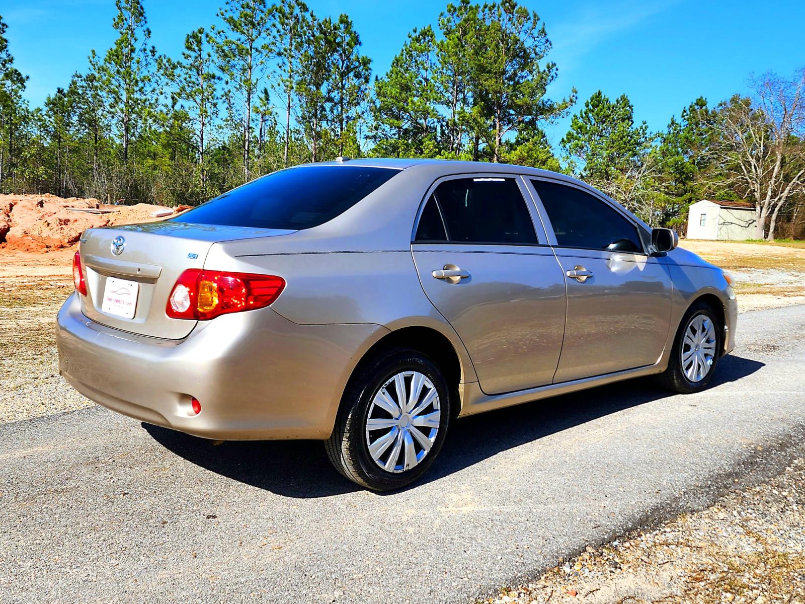 2010 Gold Toyota Corolla Base 4-Speed AT (2T1BU4EE0AC) with an 1.8L L4 DOHC 16V engine, 4-Speed Automatic transmission, located at 18001 Kellogg Rd., Saucier, MS, 39574, (228) 832-1441, 0.000000, 0.000000 - Photo #5