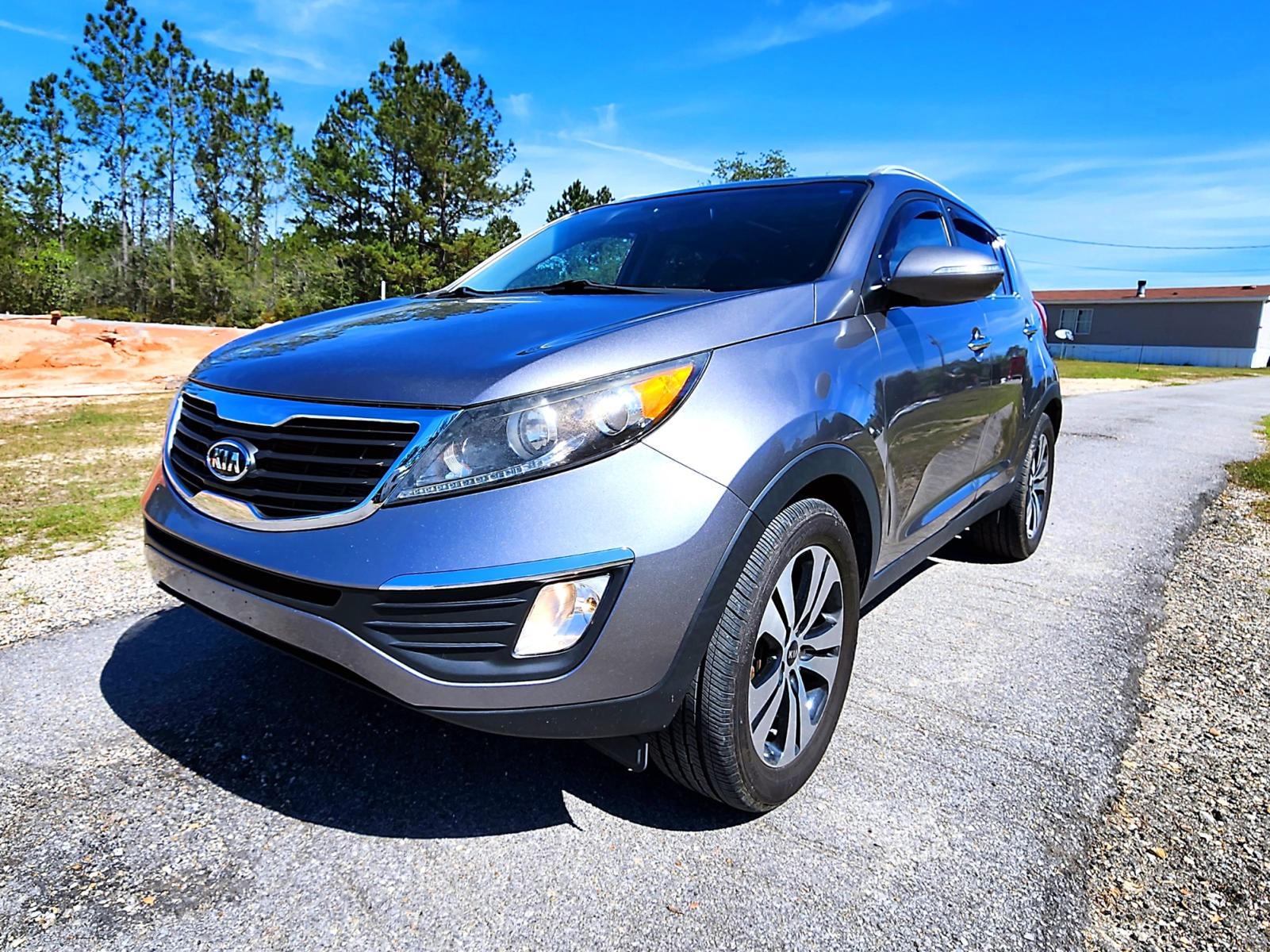 2012 Silver Kia Sportage EX FWD (KNDPC3A21C7) with an 2.4L V6 DOHC 24V engine, 6-Speed Automatic transmission, located at 18001 Kellogg Rd, Saucier, MS, 39574, (228) 832-1441, 139.421463, -76.641457 - Photo #1