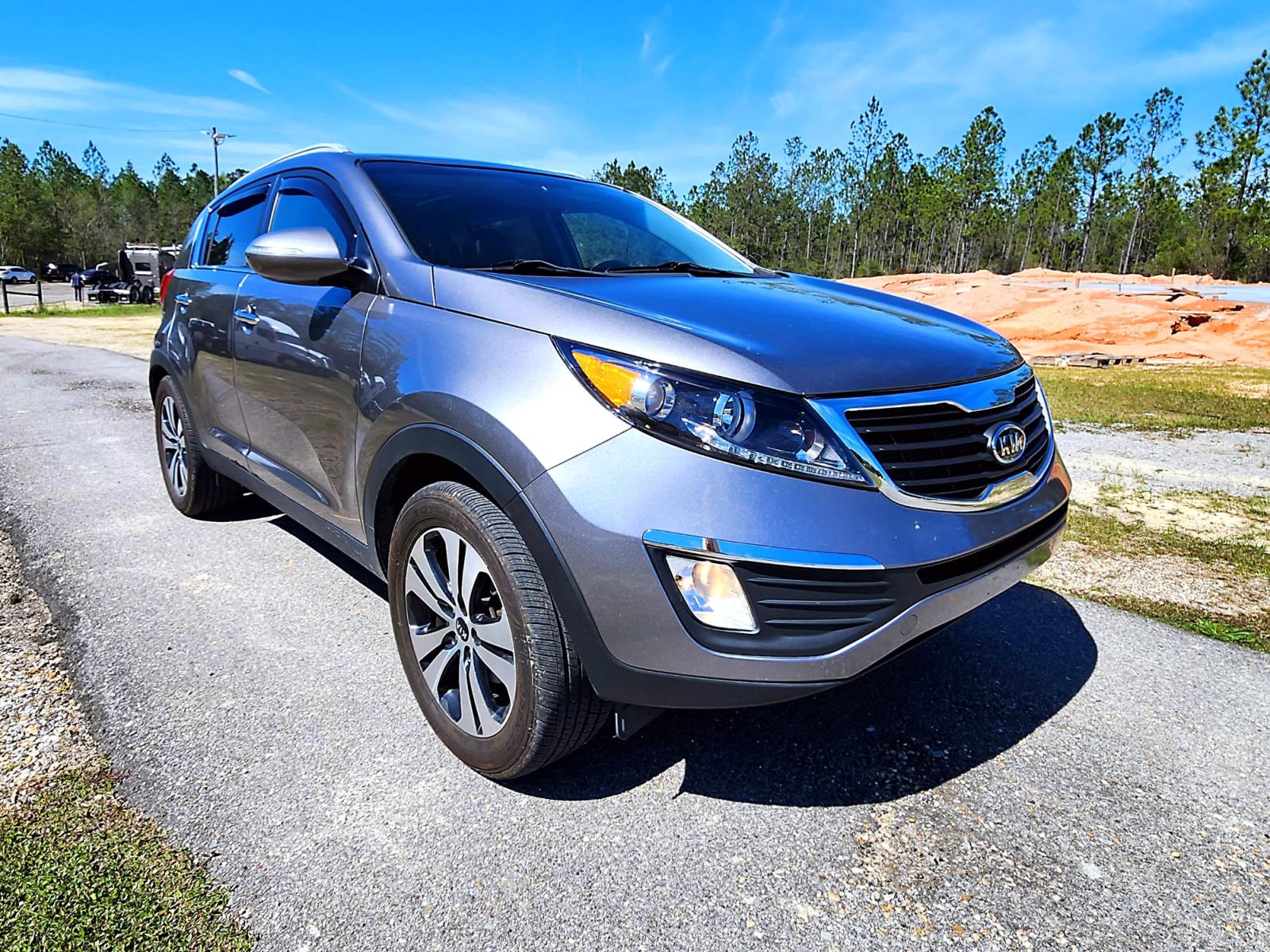 2012 Silver Kia Sportage EX FWD (KNDPC3A21C7) with an 2.4L V6 DOHC 24V engine, 6-Speed Automatic transmission, located at 18001 Kellogg Rd, Saucier, MS, 39574, (228) 832-1441, 139.421463, -76.641457 - Photo #26