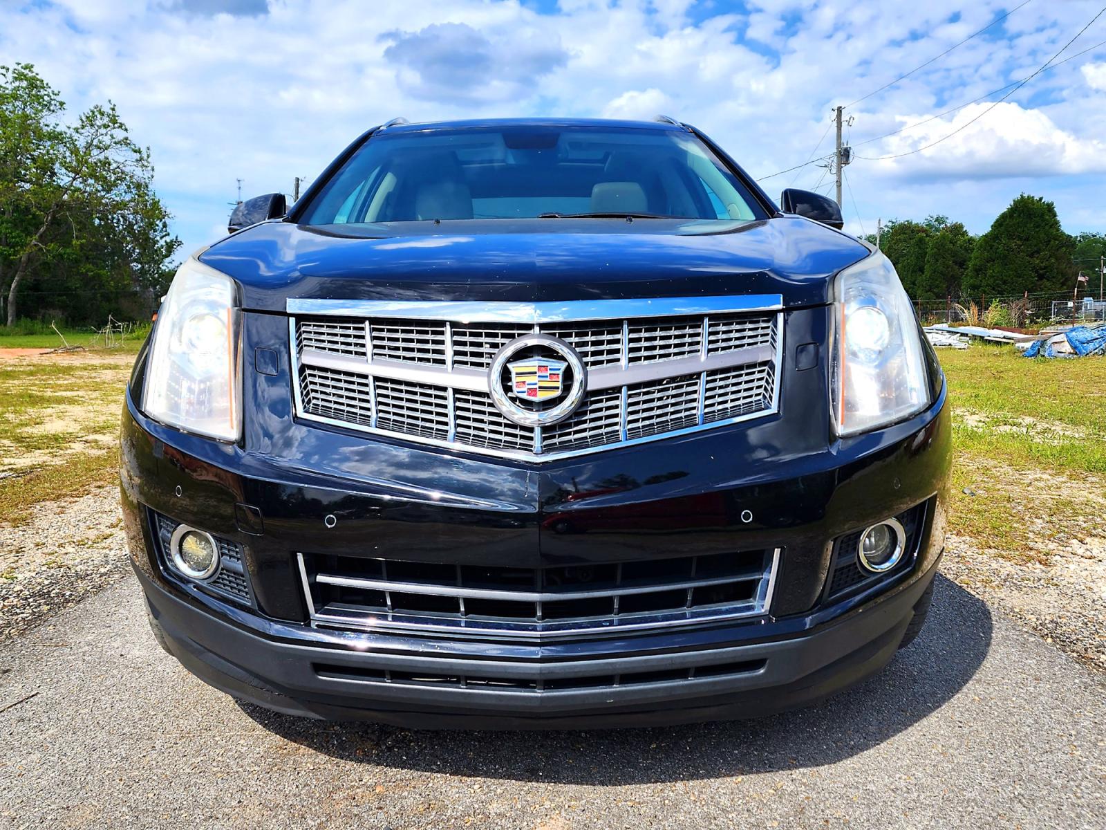 2012 Black Cadillac SRX Performance (3GYFNBE31CS) with an 3.6L V6 DOHC 24V FFV engine, 6-Speed Automatic transmission, located at 18001 Kellogg Rd., Saucier, MS, 39574, (228) 832-1441, 0.000000, 0.000000 - GREAT VALUE !! 2012 CADILLAC SRX PERFORMANCE – CADILLAC Strong! - V6! 3.6L DOHC 24V FFV – Runs GREAT - Just Serviced! – CARFAX Well-Maintained Vehicle! – CARFAX GREAT-VALUE Vehicle! – AUTOMATIC Transmission – PUSH to START – Ice COLD A/C � - Photo #1
