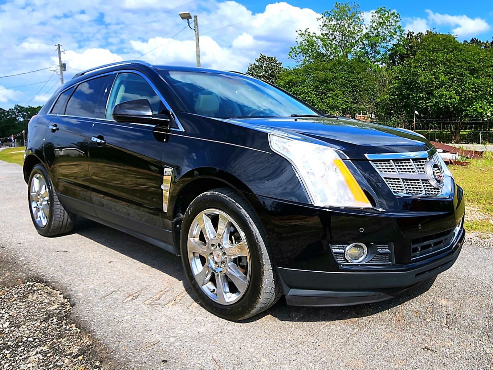2012 Black Cadillac SRX Performance (3GYFNBE31CS) with an 3.6L V6 DOHC 24V FFV engine, 6-Speed Automatic transmission, located at 18001 Kellogg Rd., Saucier, MS, 39574, (228) 832-1441, 0.000000, 0.000000 - GREAT VALUE !! 2012 CADILLAC SRX PERFORMANCE – CADILLAC Strong! - V6! 3.6L DOHC 24V FFV – Runs GREAT - Just Serviced! – CARFAX Well-Maintained Vehicle! – CARFAX GREAT-VALUE Vehicle! – AUTOMATIC Transmission – PUSH to START – Ice COLD A/C � - Photo #2