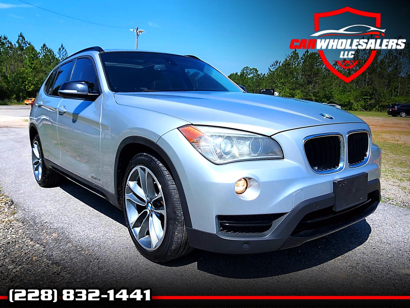 2014 Silver BMW X1 sDrive28i (WBAVM1C57EV) with an 2.0L L4 DOHC 16V engine, 8-Speed Automatic transmission, located at 18001 Kellogg Rd., Saucier, MS, 39574, (228) 832-1441, 0.000000, 0.000000 - Photo #0