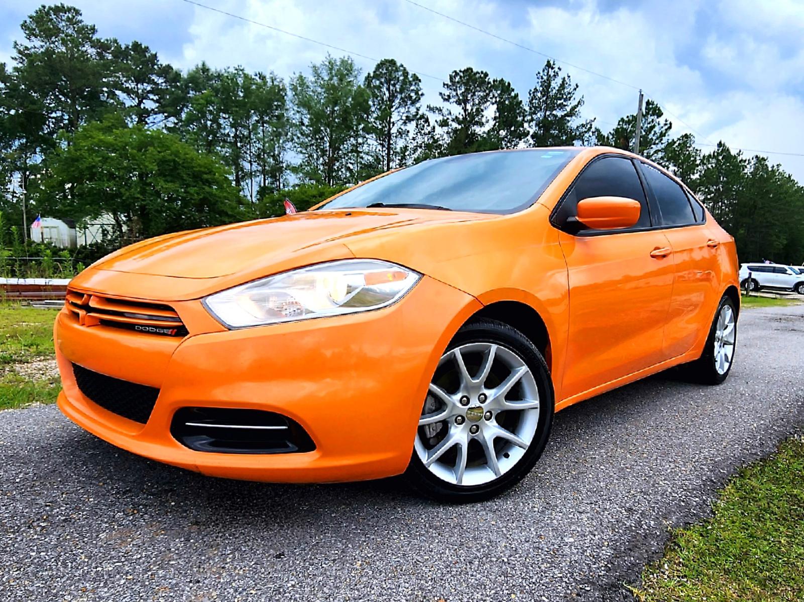 2013 Orange Dodge Dart SXT (1C3CDFBA8DD) with an 2.0L L4 DOHC 16V TURBO engine, Automatic transmission, located at 18001 Kellogg Rd., Saucier, MS, 39574, (228) 832-1441, 0.000000, 0.000000 - Photo #1