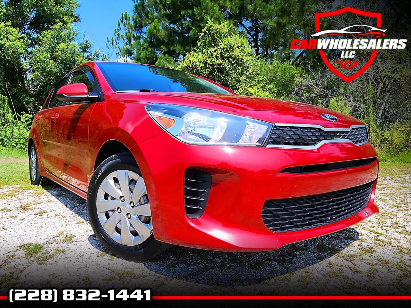 2018 Red Kia Rio S (3KPA25AB4JE) with an 1.6L L4 DOHC 16V engine, 6 Automatic transmission, located at 18001 Kellogg Rd., Saucier, MS, 39574, (228) 832-1441, 0.000000, 0.000000 - CLEAN CARFAX !! 2018 KIA RIO S HATCHBACK – It's A CARFAX 2-OWNER Vehicle – It's A CLEAN CARFAX Vehicle! – KIA Strong! - 1.6L DOHC 16V – Runs GREAT - Just Serviced! – FUEL SAVER!! est. 32 MPG hwy! – AUTOMATIC Transmission – Ice COLD A/C with Rear - Photo #0