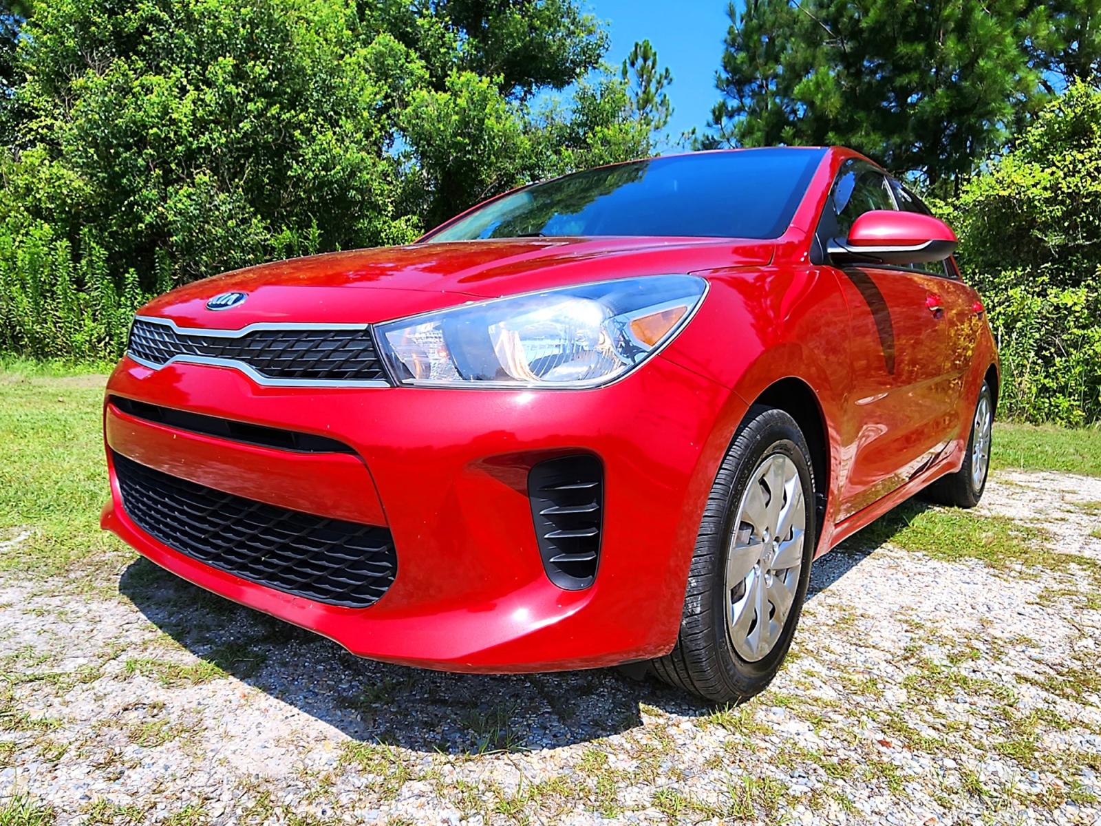 2018 Red Kia Rio S (3KPA25AB4JE) with an 1.6L L4 DOHC 16V engine, 6 Automatic transmission, located at 18001 Kellogg Rd., Saucier, MS, 39574, (228) 832-1441, 0.000000, 0.000000 - CLEAN CARFAX !! 2018 KIA RIO S HATCHBACK – It's A CARFAX 2-OWNER Vehicle – It's A CLEAN CARFAX Vehicle! – KIA Strong! - 1.6L DOHC 16V – Runs GREAT - Just Serviced! – FUEL SAVER!! est. 32 MPG hwy! – AUTOMATIC Transmission – Ice COLD A/C with Rear - Photo #1