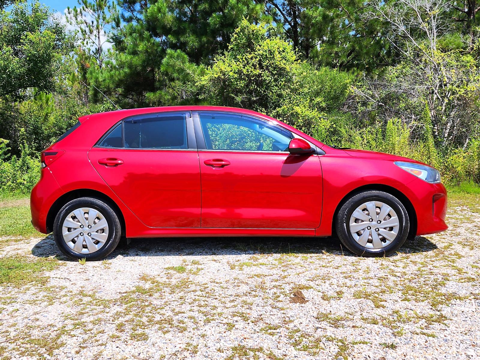 2018 Red Kia Rio S (3KPA25AB4JE) with an 1.6L L4 DOHC 16V engine, 6 Automatic transmission, located at 18001 Kellogg Rd., Saucier, MS, 39574, (228) 832-1441, 0.000000, 0.000000 - CLEAN CARFAX !! 2018 KIA RIO S HATCHBACK – It's A CARFAX 2-OWNER Vehicle – It's A CLEAN CARFAX Vehicle! – KIA Strong! - 1.6L DOHC 16V – Runs GREAT - Just Serviced! – FUEL SAVER!! est. 32 MPG hwy! – AUTOMATIC Transmission – Ice COLD A/C with Rear - Photo #2
