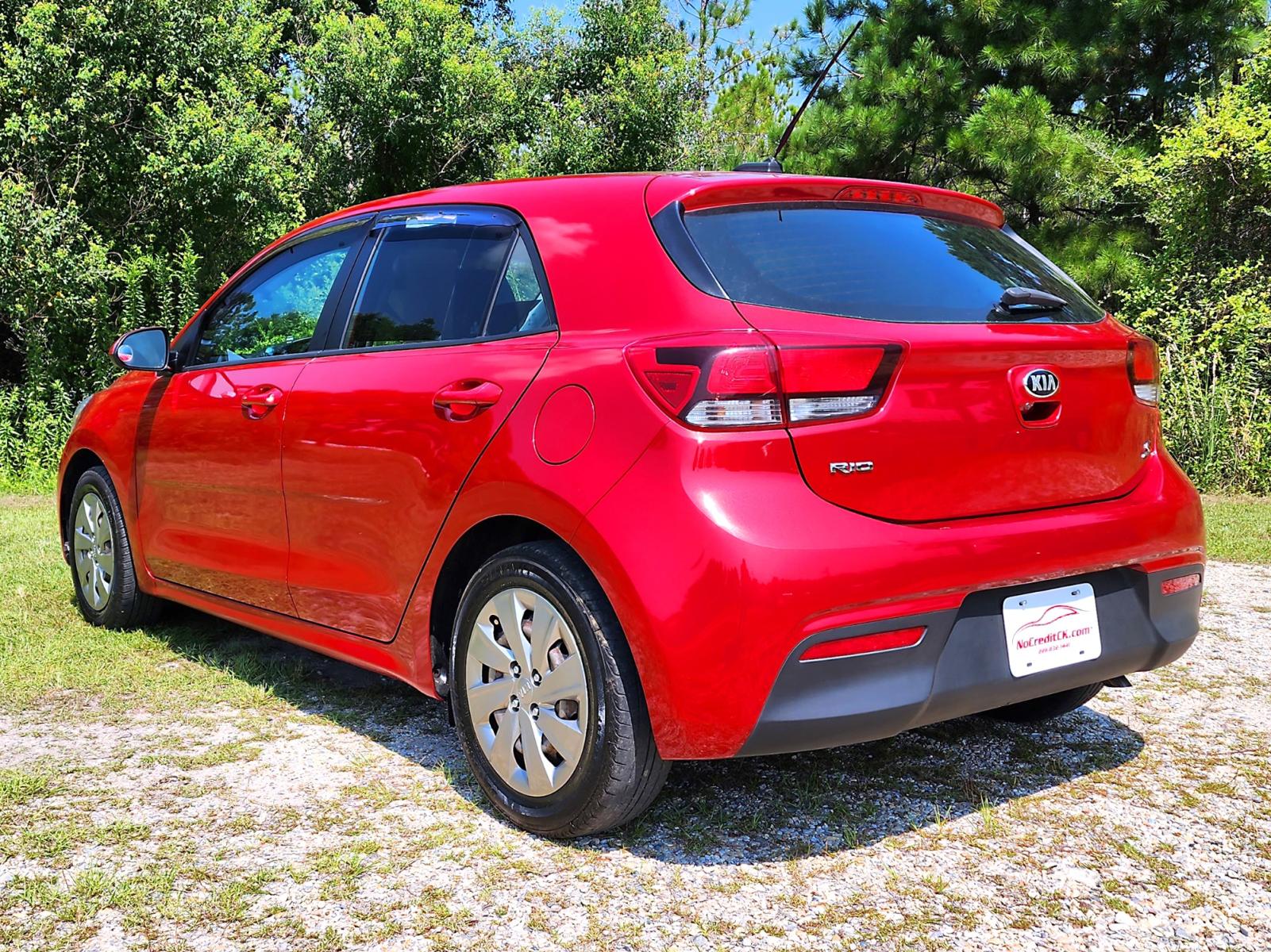 2018 Red Kia Rio S (3KPA25AB4JE) with an 1.6L L4 DOHC 16V engine, 6 Automatic transmission, located at 18001 Kellogg Rd., Saucier, MS, 39574, (228) 832-1441, 0.000000, 0.000000 - CLEAN CARFAX !! 2018 KIA RIO S HATCHBACK – It's A CARFAX 2-OWNER Vehicle – It's A CLEAN CARFAX Vehicle! – KIA Strong! - 1.6L DOHC 16V – Runs GREAT - Just Serviced! – FUEL SAVER!! est. 32 MPG hwy! – AUTOMATIC Transmission – Ice COLD A/C with Rear - Photo #4