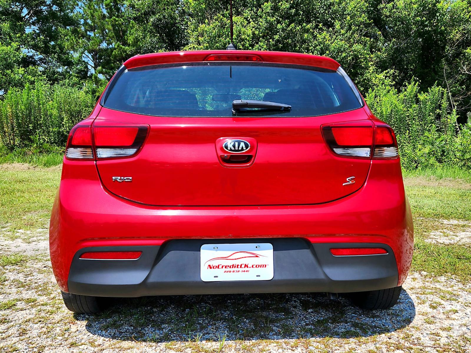 2018 Red Kia Rio S (3KPA25AB4JE) with an 1.6L L4 DOHC 16V engine, 6 Automatic transmission, located at 18001 Kellogg Rd., Saucier, MS, 39574, (228) 832-1441, 0.000000, 0.000000 - CLEAN CARFAX !! 2018 KIA RIO S HATCHBACK – It's A CARFAX 2-OWNER Vehicle – It's A CLEAN CARFAX Vehicle! – KIA Strong! - 1.6L DOHC 16V – Runs GREAT - Just Serviced! – FUEL SAVER!! est. 32 MPG hwy! – AUTOMATIC Transmission – Ice COLD A/C with Rear - Photo #5