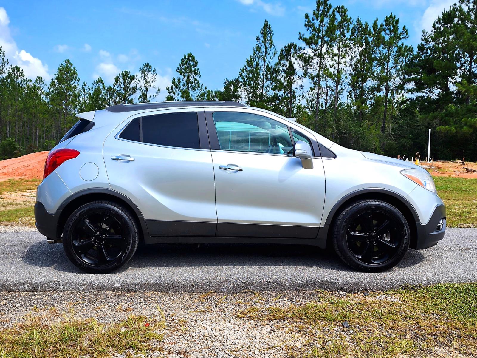 2014 Silver Buick Encore Convenience FWD (KL4CJBSB7EB) with an 1.4L L4 DOHC 16V TURBO engine, 6-Speed Automatic transmission, located at 18001 Kellogg Rd., Saucier, MS, 39574, (228) 832-1441, 0.000000, 0.000000 - Photo #3