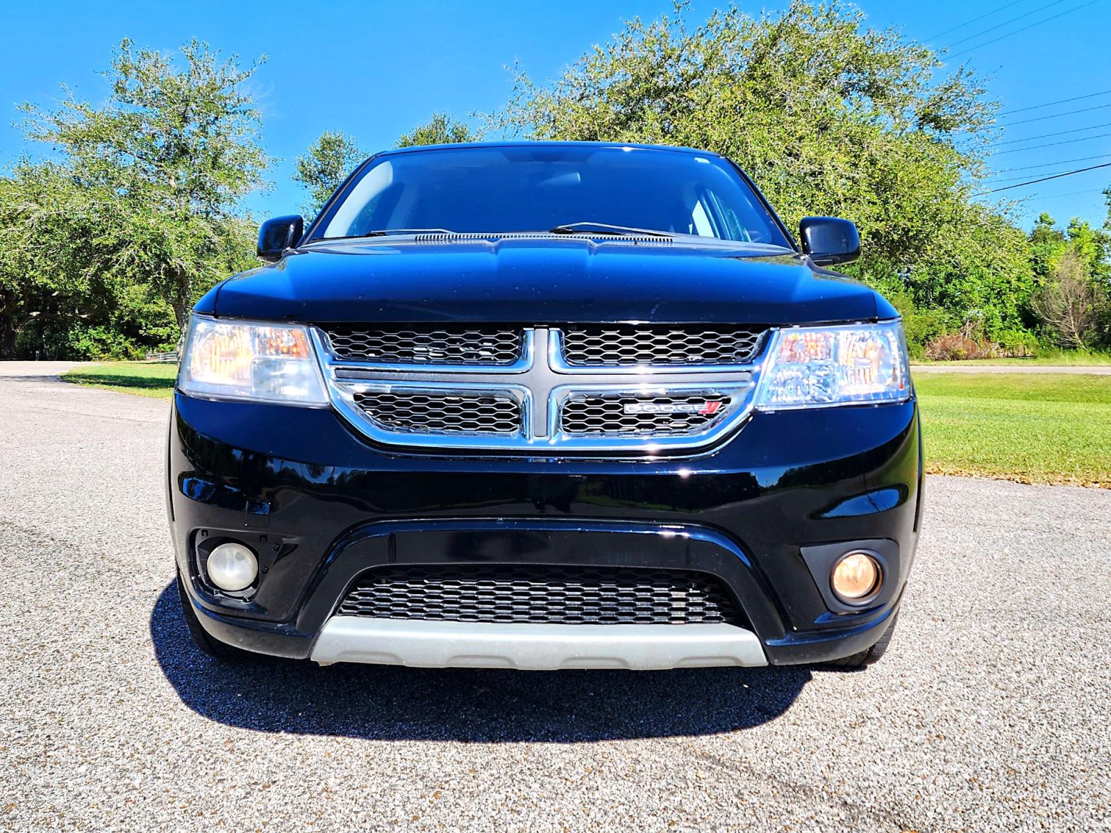 2017 Black Dodge Journey SXT (3C4PDCBG5HT) with an 3.6L V6 DOHC 24V engine, Automatic transmission, located at 18001 Kellogg Rd., Saucier, MS, 39574, (228) 832-1441, 0.000000, 0.000000 - THIRD ROW !! 2017 DODGE JOURNEY SXT – It's A CARFAX 2-OWNER Vehicle – DODGE Strong! - V8! 5.7L OHV 16V – Runs GREAT - Just Serviced! – AUTOMATIC Transmission – PUSH to START – Ice COLD A/C – AM // FM // XM // CD // AUX // USB // BLUETOOTH Stereo - Photo #2