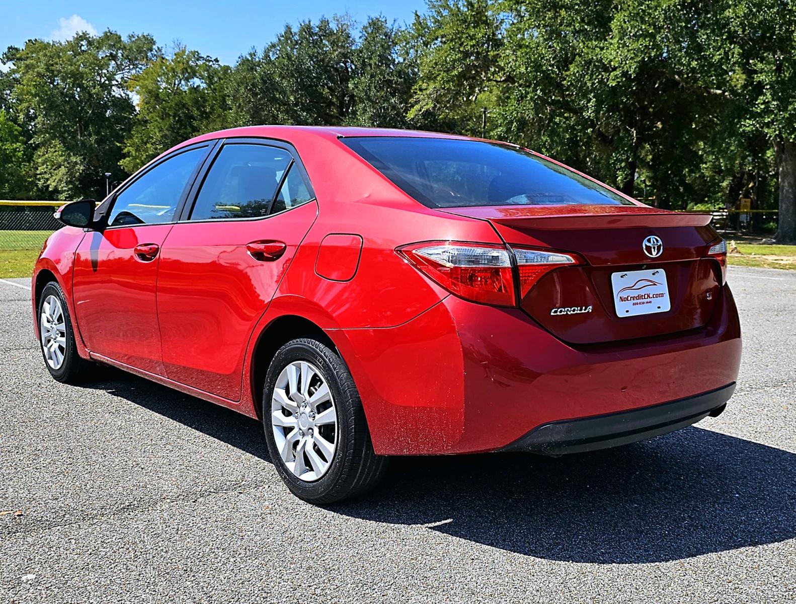 2014 Red Toyota Corolla L 4-Speed AT (5YFBURHE8EP) with an 1.8L L4 DOHC 16V engine, 4-Speed Automatic transmission, located at 18001 Kellogg Rd., Saucier, MS, 39574, (228) 832-1441, 0.000000, 0.000000 - Photo #6