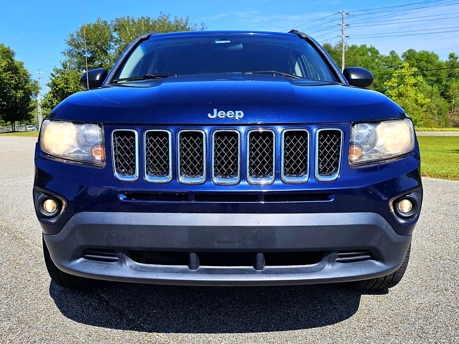 2014 Blue Jeep Compass Sport FWD (1C4NJCBA5ED) with an 2.0L L4 DOHC 16V engine, AUTOMATIC transmission, located at 18001 Kellogg Rd., Saucier, MS, 39574, (228) 832-1441, 0.000000, 0.000000 - CLEAN CARFAX !! 2014 JEEP COMPASS SPORT – JEEP Strong! - 2.0L DOHC 16V – Runs GREAT - Just Serviced! – CLEAN CARFAX Vehicle! – FUEL SAVER!! est. 30 MPG hwy! – AUTOMATIC Transmission – Ice COLD A/C – Aftermarket -AM // FM // XM // CD // USB // MP3 // BLUETOOTH Stereo � - Photo #2