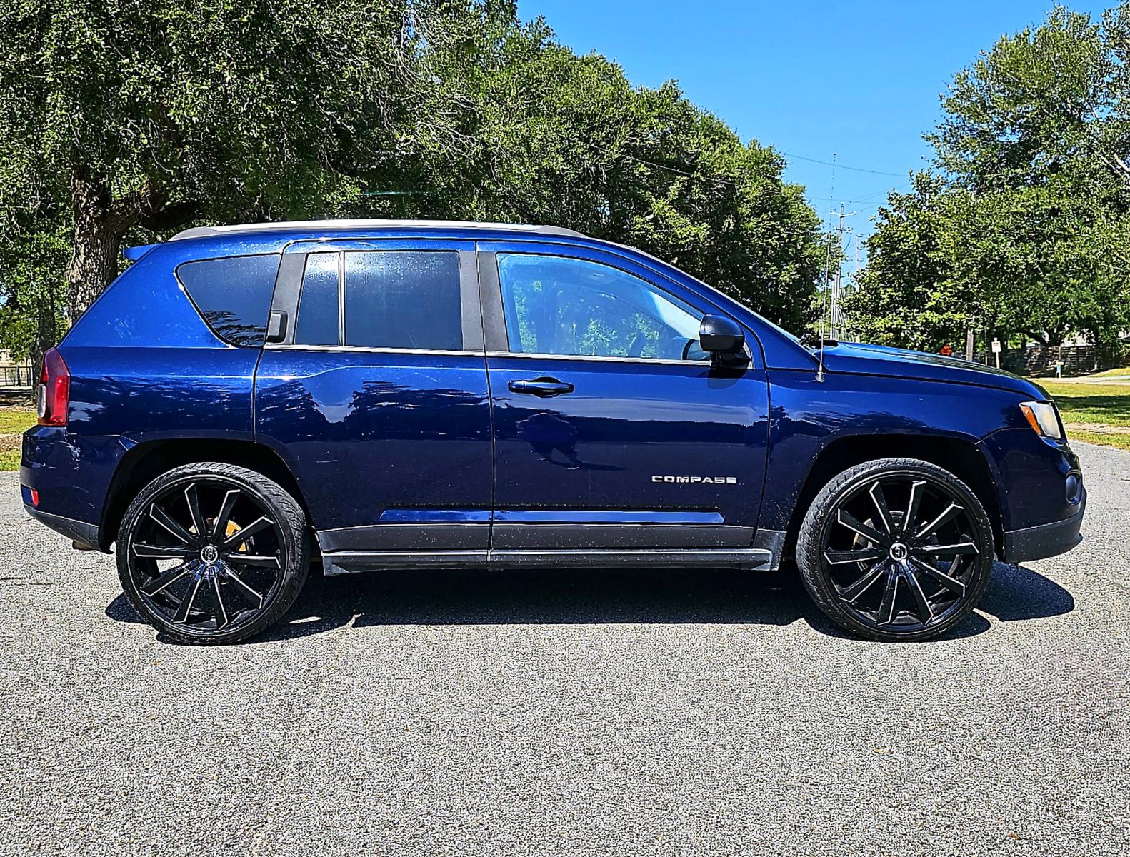 2014 Blue Jeep Compass Sport FWD (1C4NJCBA5ED) with an 2.0L L4 DOHC 16V engine, AUTOMATIC transmission, located at 18001 Kellogg Rd., Saucier, MS, 39574, (228) 832-1441, 0.000000, 0.000000 - CLEAN CARFAX !! 2014 JEEP COMPASS SPORT – JEEP Strong! - 2.0L DOHC 16V – Runs GREAT - Just Serviced! – CLEAN CARFAX Vehicle! – FUEL SAVER!! est. 30 MPG hwy! – AUTOMATIC Transmission – Ice COLD A/C – Aftermarket -AM // FM // XM // CD // USB // MP3 // BLUETOOTH Stereo � - Photo #3