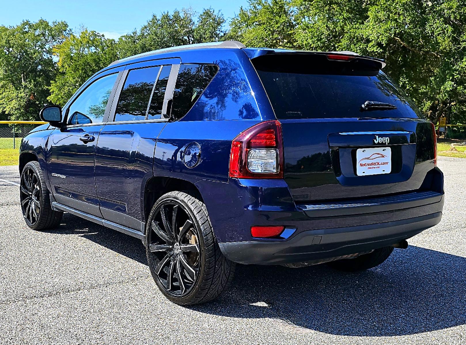 2014 Blue Jeep Compass Sport FWD (1C4NJCBA5ED) with an 2.0L L4 DOHC 16V engine, AUTOMATIC transmission, located at 18001 Kellogg Rd., Saucier, MS, 39574, (228) 832-1441, 0.000000, 0.000000 - CLEAN CARFAX !! 2014 JEEP COMPASS SPORT – JEEP Strong! - 2.0L DOHC 16V – Runs GREAT - Just Serviced! – CLEAN CARFAX Vehicle! – FUEL SAVER!! est. 30 MPG hwy! – AUTOMATIC Transmission – Ice COLD A/C – Aftermarket -AM // FM // XM // CD // USB // MP3 // BLUETOOTH Stereo � - Photo #6