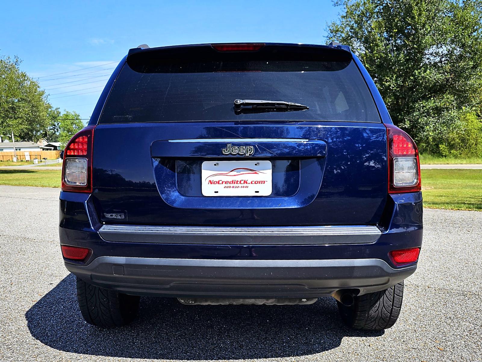 2014 Blue Jeep Compass Sport FWD (1C4NJCBA5ED) with an 2.0L L4 DOHC 16V engine, AUTOMATIC transmission, located at 18001 Kellogg Rd., Saucier, MS, 39574, (228) 832-1441, 0.000000, 0.000000 - CLEAN CARFAX !! 2014 JEEP COMPASS SPORT – JEEP Strong! - 2.0L DOHC 16V – Runs GREAT - Just Serviced! – CLEAN CARFAX Vehicle! – FUEL SAVER!! est. 30 MPG hwy! – AUTOMATIC Transmission – Ice COLD A/C – Aftermarket -AM // FM // XM // CD // USB // MP3 // BLUETOOTH Stereo � - Photo #7