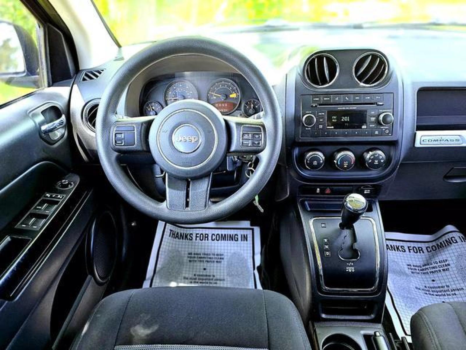 2017 Black Jeep Compass Sport SUV 4D (1C4NJCBAXHD) , Auto, 6-Spd AutoStick transmission, located at 18001 Kellogg Rd, Saucier, MS, 39574, (228) 832-1441, 139.421463, -76.641457 - Photo #11