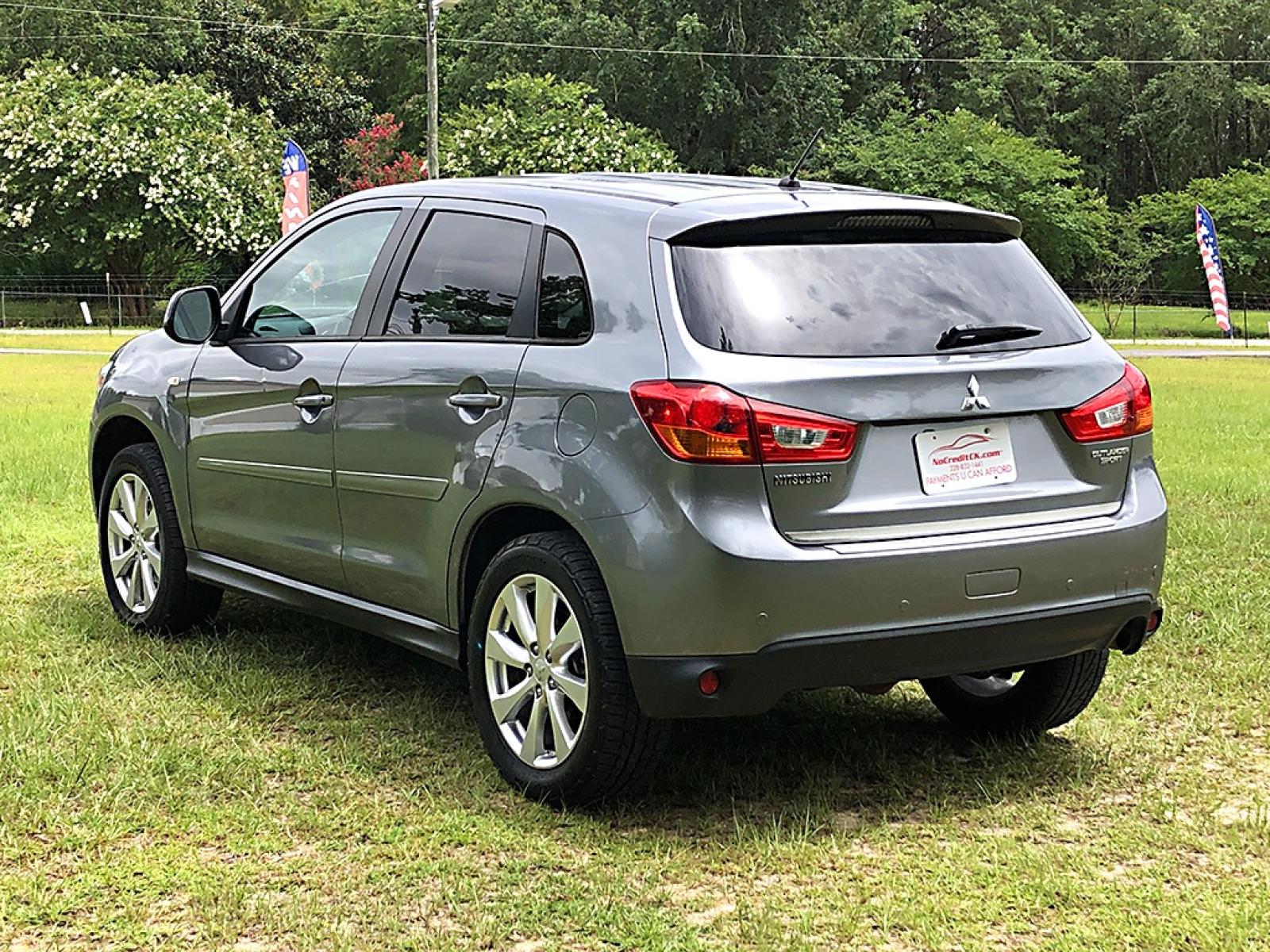 2015 Grey Mitsubishi Outlander Sport ES 2WD (4A4AP3AU7FE) with an 2.0L L4 DOHC 16V engine, Manual Transmission transmission, located at 18001 Kellogg Rd, Saucier, MS, 39574, (228) 832-1441, 139.421463, -76.641457 - NO CREDIT CHECK !! 2015 MITSUBISHI OUTLANDER – MITSUBISHI Strong! - 2.0L DOHC 16V – Runs GREAT - Just Serviced! – CARFAX 2-OWNER Vehicle – FUEL SAVER!! est. 32 MPG hwy! – Ice COLD A/C – AM // FM // CD // AUX // USB // MP3 // BLUETOOTH Stereo – B - Photo #3